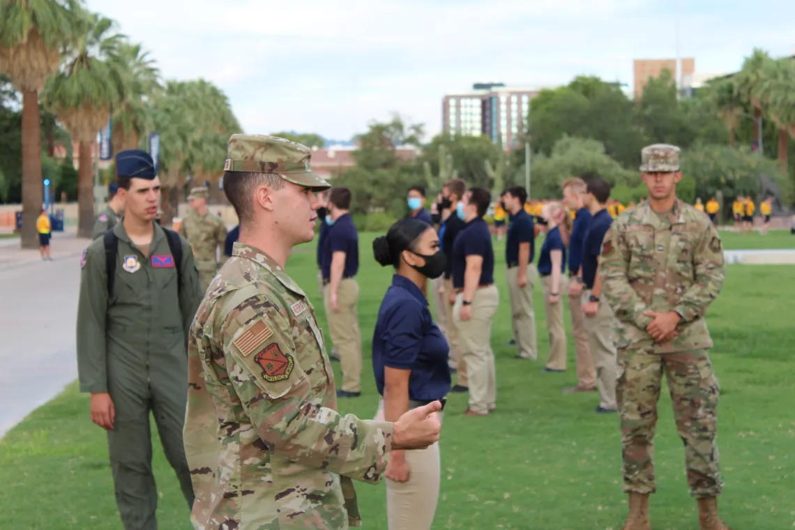 Cadets walking across a field